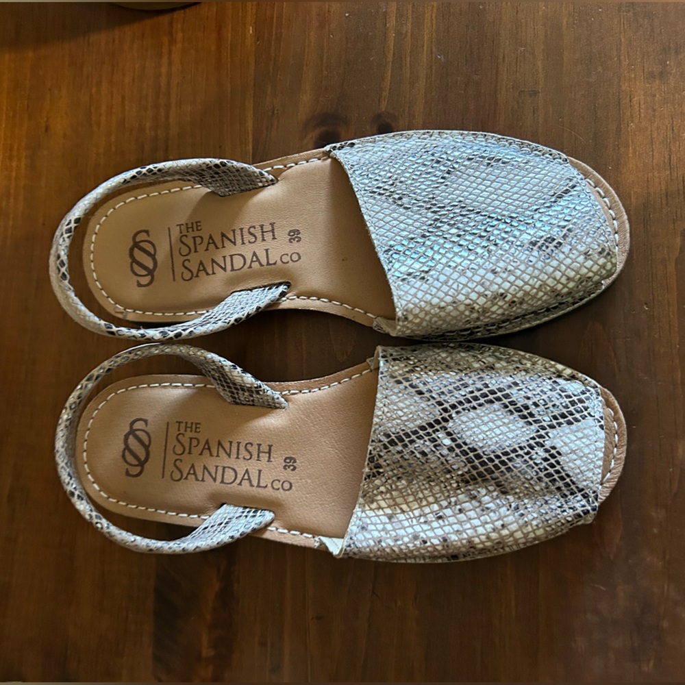 Spanish Sandal Company flat sandals with peek-a-boo toe.